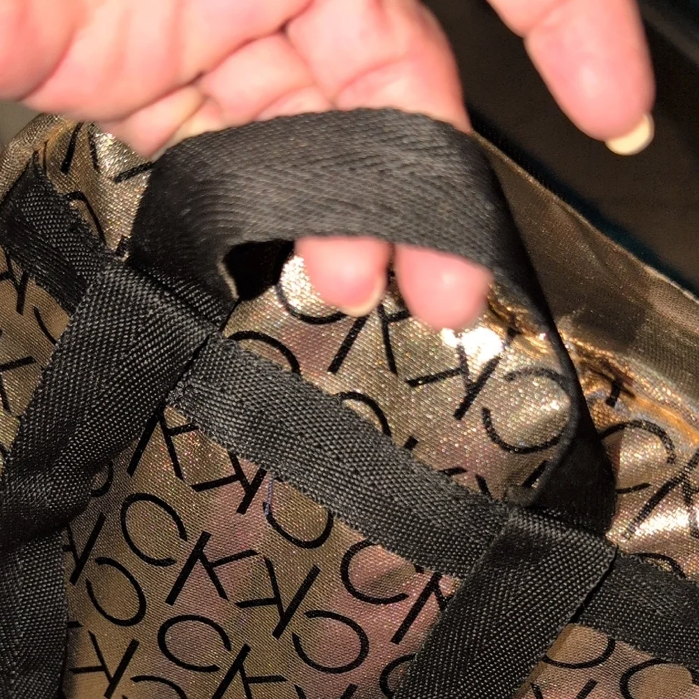 Calvin Klein Metallic Gold Backpack with Black Logo